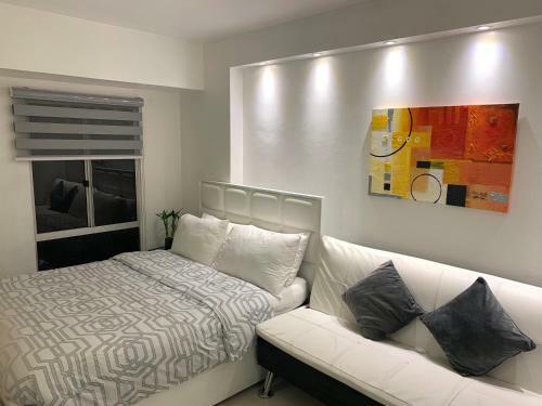 Apartamentos Avida Condo Near Naia