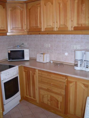 K�roly Apartments