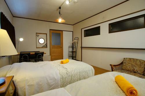 Hostal Hakuba Station Guesthouse En
