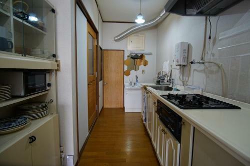 Hostal Hakuba Station Guesthouse En