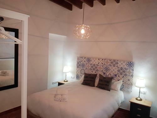 Reservaloen Casa Sevillana