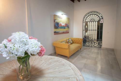 Reservaloen Casa Sevillana