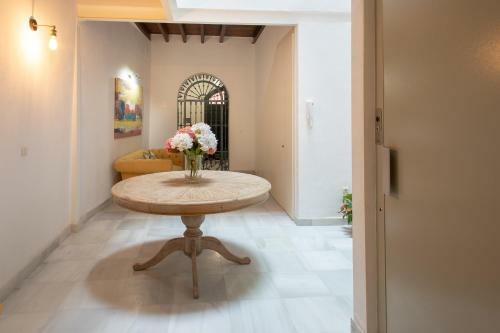 Reservaloen Casa Sevillana