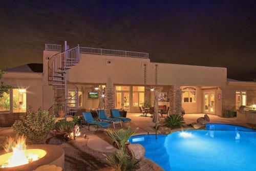 Oasis In The Desert Near Boulders