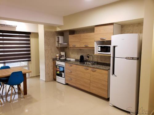 Apartamento Malvinas Departamentos