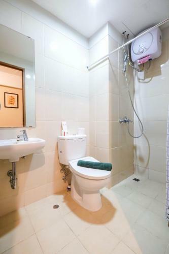 Comfortable 1br The Oasis Lippo Cikarang Apartment By Travelio