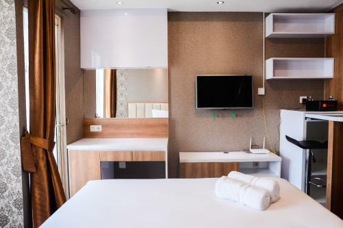 Comfortable Studio The Oasis Lippo Cikarang Apartment By Travelio
