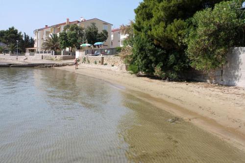 Apartments With A Parking Space Banjol (rab) - 11082