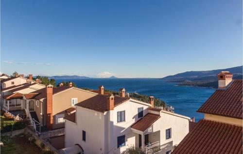 Three-bedroom Apartment In Rabac
