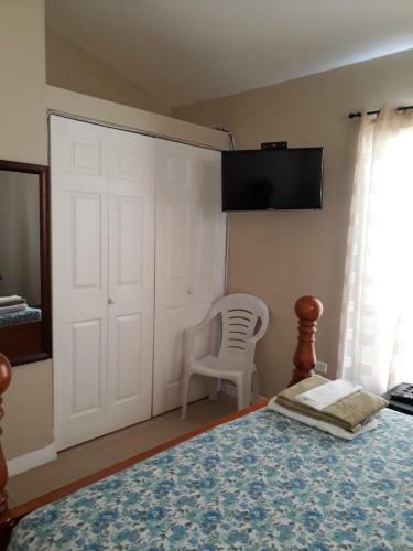 Spanish Town Gated Secured Private Rooms