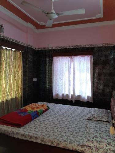Hotel Goroomgo Sureswory Pampa Puri