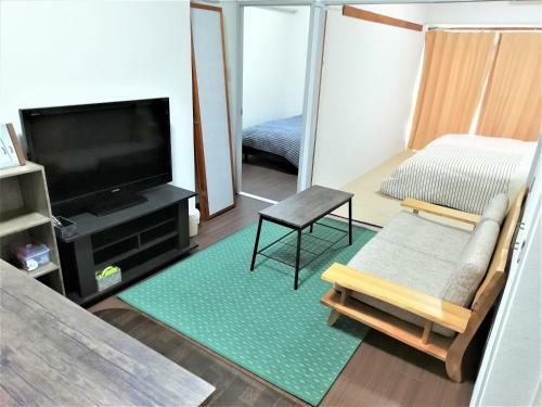 Near Tram Apartment Okayama