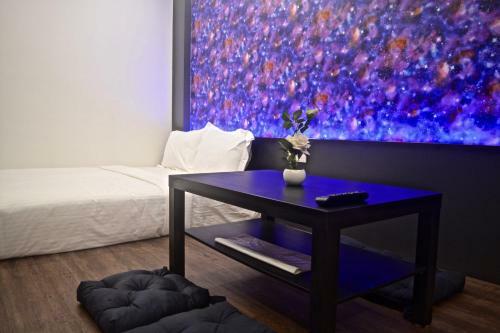 Iconic Suites & Pods Hotel