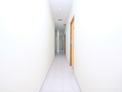 Hostal Oyo 89493 Q Hotel