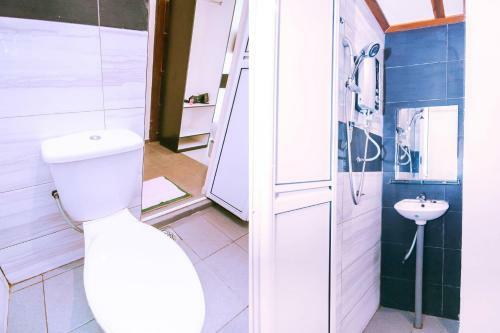 Hostal Oyo 925 Nawawi's Cottage
