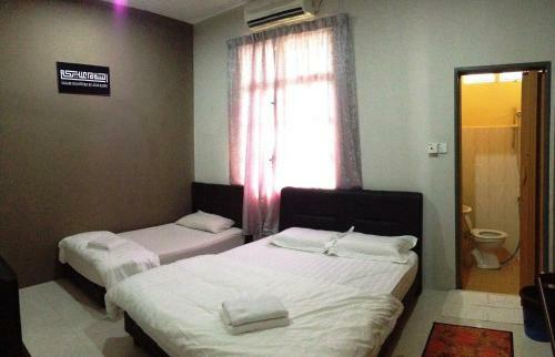 Hostal Anggun Beach Guest House