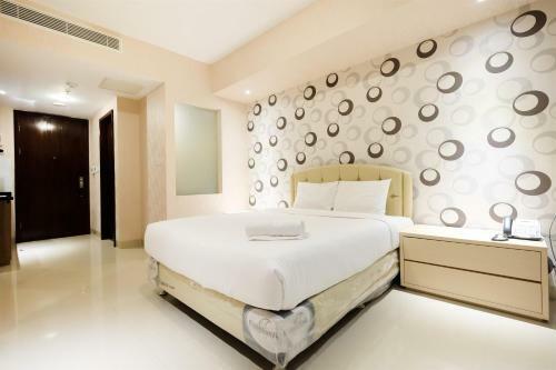 Dazzle Studio Room @ U-residence Apartment By Travelio