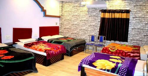 Hotel Double Bedded Room With A Single Cart Bed