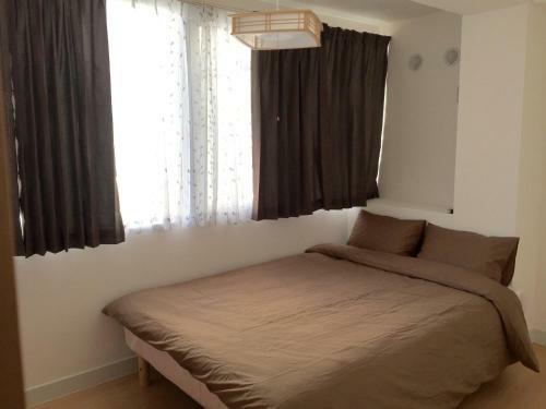 Apartamento Issyuku Hostel