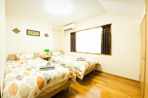 Hostal Okinawa New Hope Yomitan