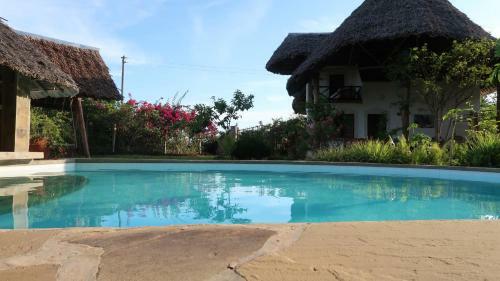 Coast Sun Gardens Cottage