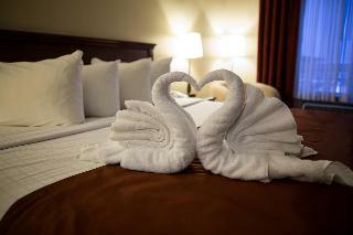 Merit Hotel & Suites