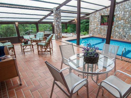 Hostal Pousada Jardim Das Montanhas