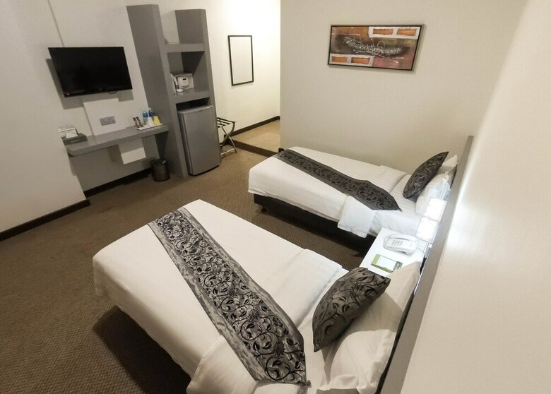 Baguss Hotel And Serviced Apartment
