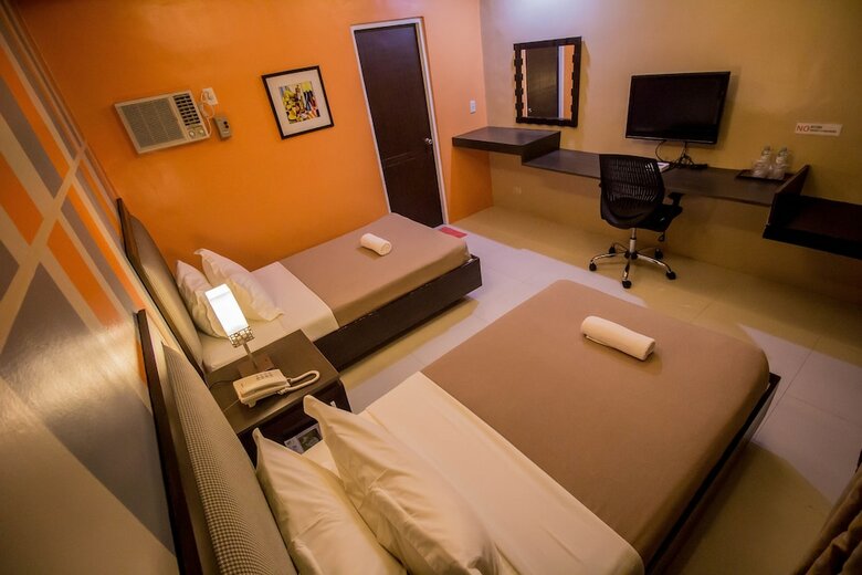 Hotel The Red Palm Suites And Restaurant