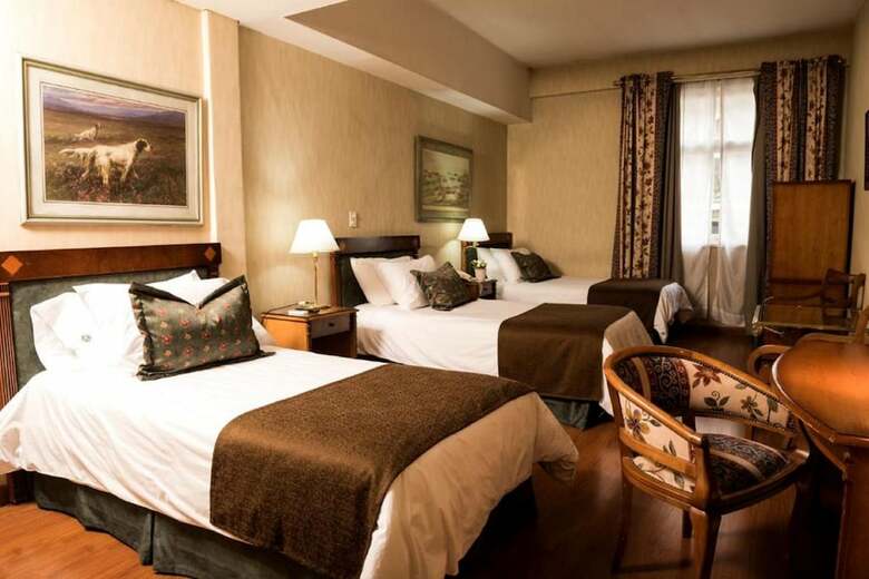 Hotel Mayflower Suites