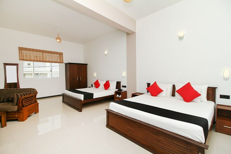 Hotel Capital O 311 Grace Beach Resort