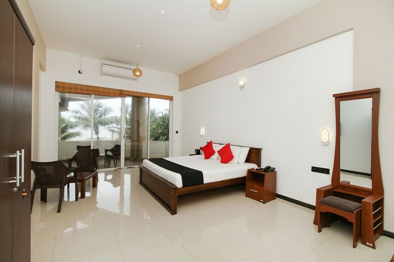 Hotel Capital O 311 Grace Beach Resort