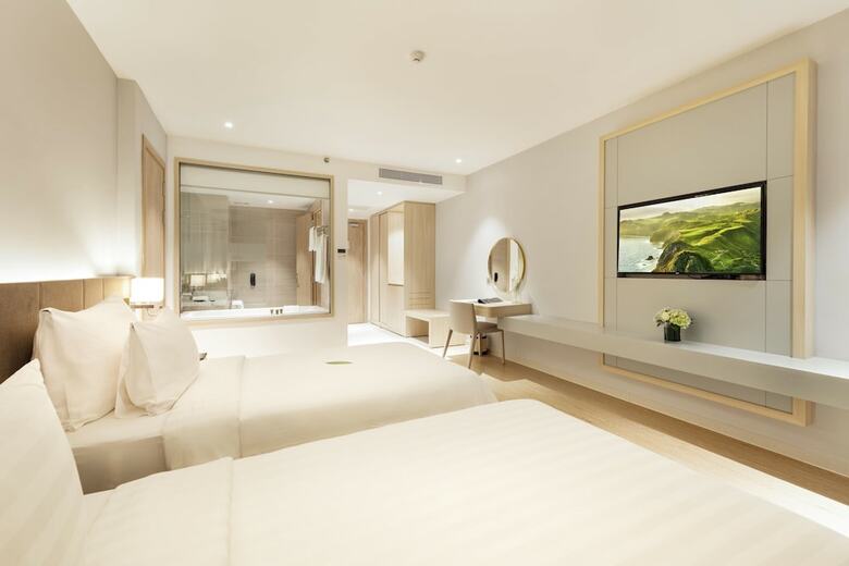 Dqua Hotel And Apartment