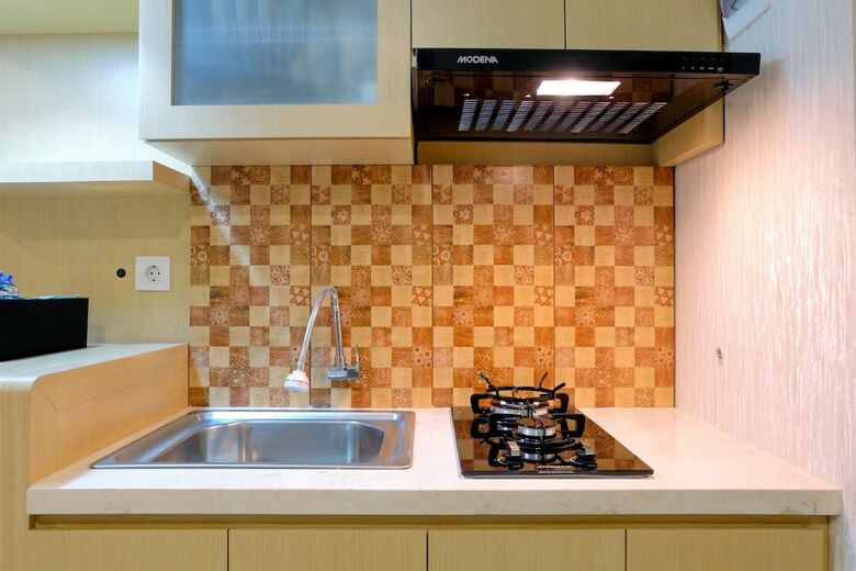 Homey Studio Apartment At Grand Kamala Lagoon