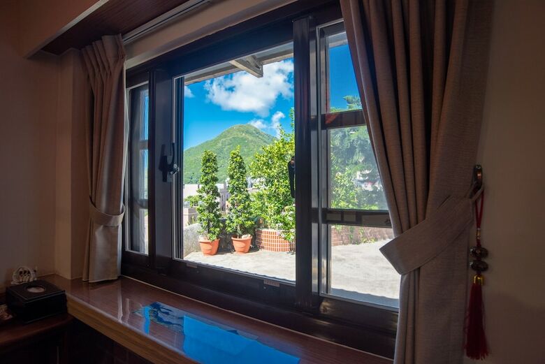 Hotel Qu Hi Home Stay