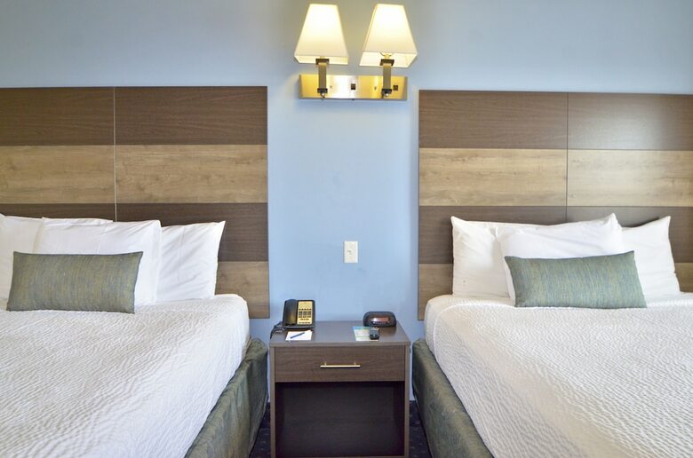 Apartamento Coastal Palms Inn & Suites