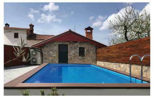 Four-bedroom Holiday Home In Komen