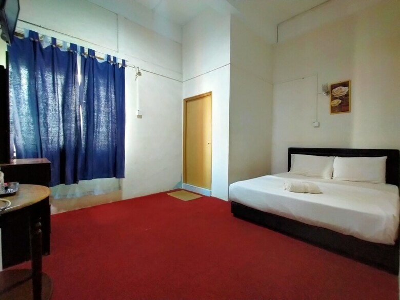 Spot On 89994 Rz Gold Hotel