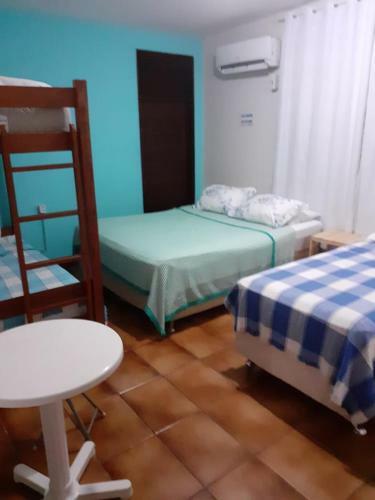 Hostal Regiane Beach Pousada Hostel