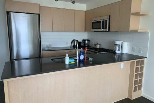 Apartamento Richmond Close Skytrain 2br By D&c