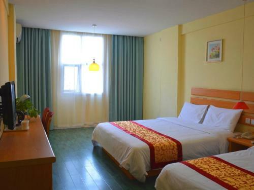 Shell Xinyu City Railway Station Plaza Hotel