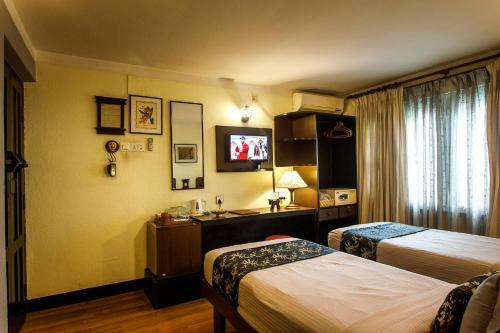 Hotel Ambassador Garden Home