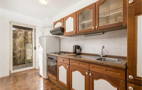 Four-bedroom Holiday Home In Lovran