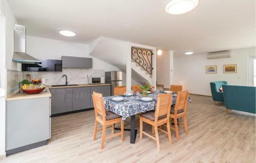 Four-bedroom Holiday Home In Putini