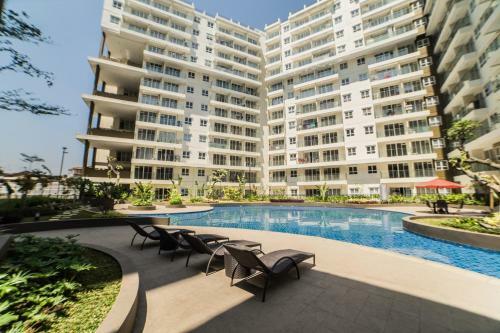 Homey 3br Apartment At Gateway Pasteur Near Exit Toll By Travelio