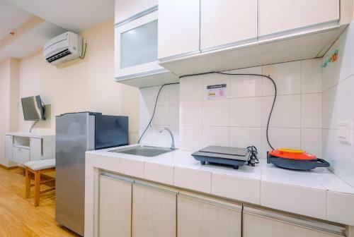 Comfy Relaxing Studio Apartment Azalea Suites Cikarang By Travelio