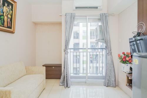 Modern Comfy 2br Serpong Greenview Apartment By Travelio
