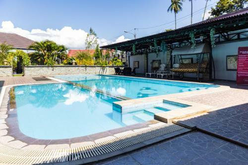 Hostal Reddoorz Premium @ Sea Residence Manado