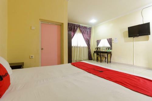 Hostal Reddoorz Near Pantai Padang