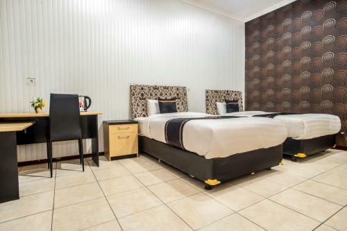 Hotel Oyo 2469 Sutomo Homestay
